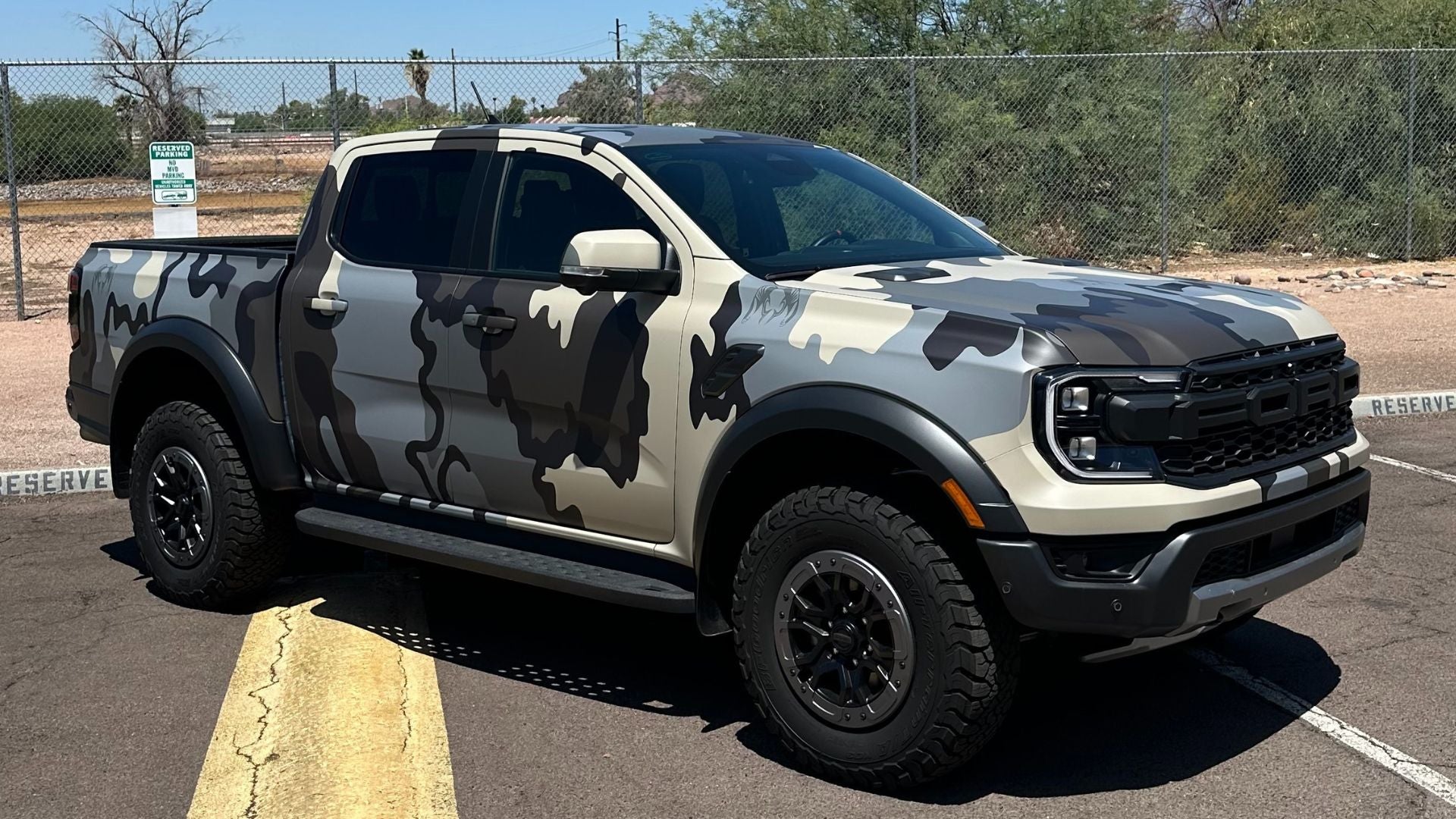 Ford truck wrapped in custom camo commercial wrap