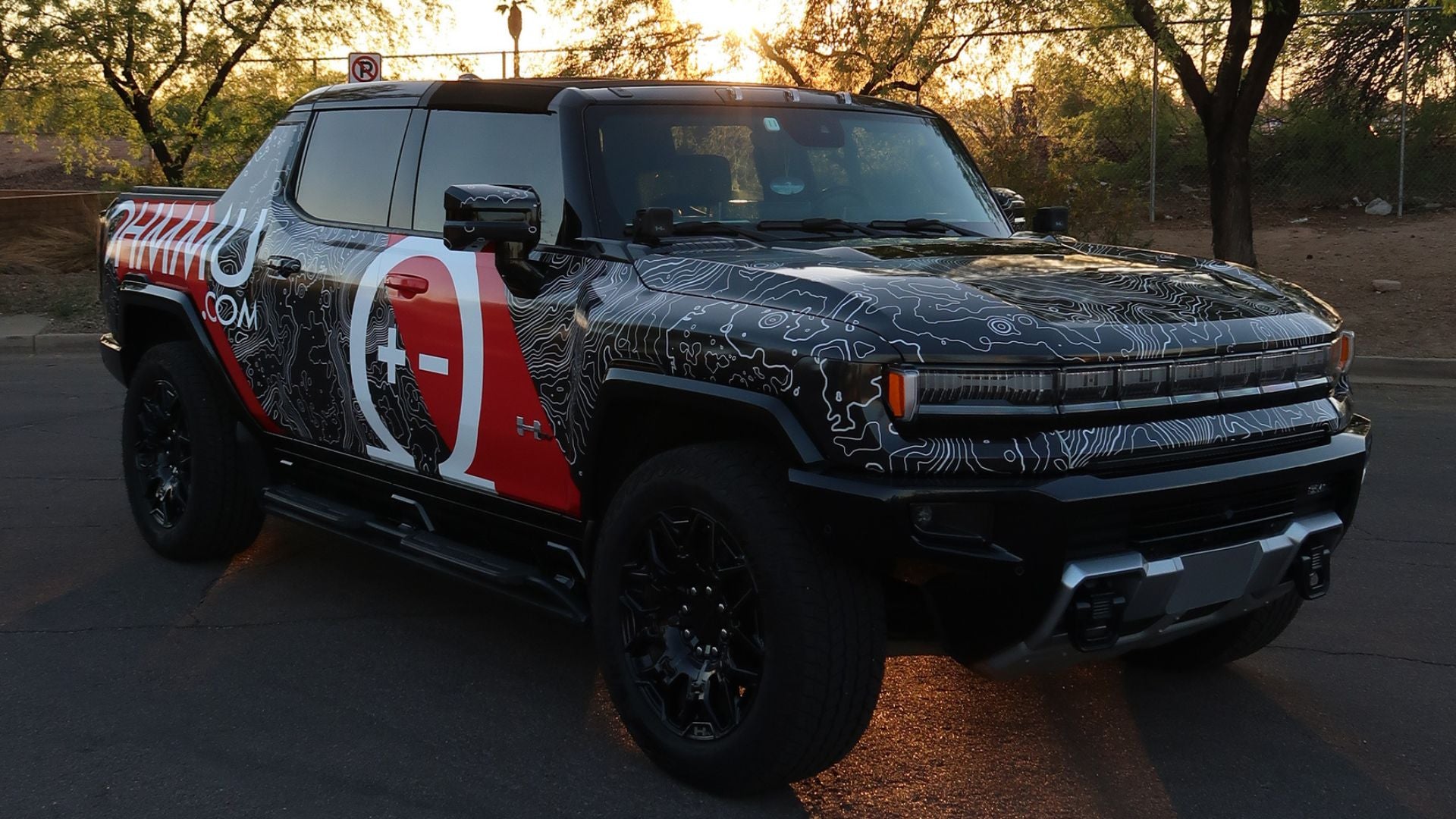 Custom-printed commercial wrap on Hummer EV for business advertising in Phoenix, Arizona