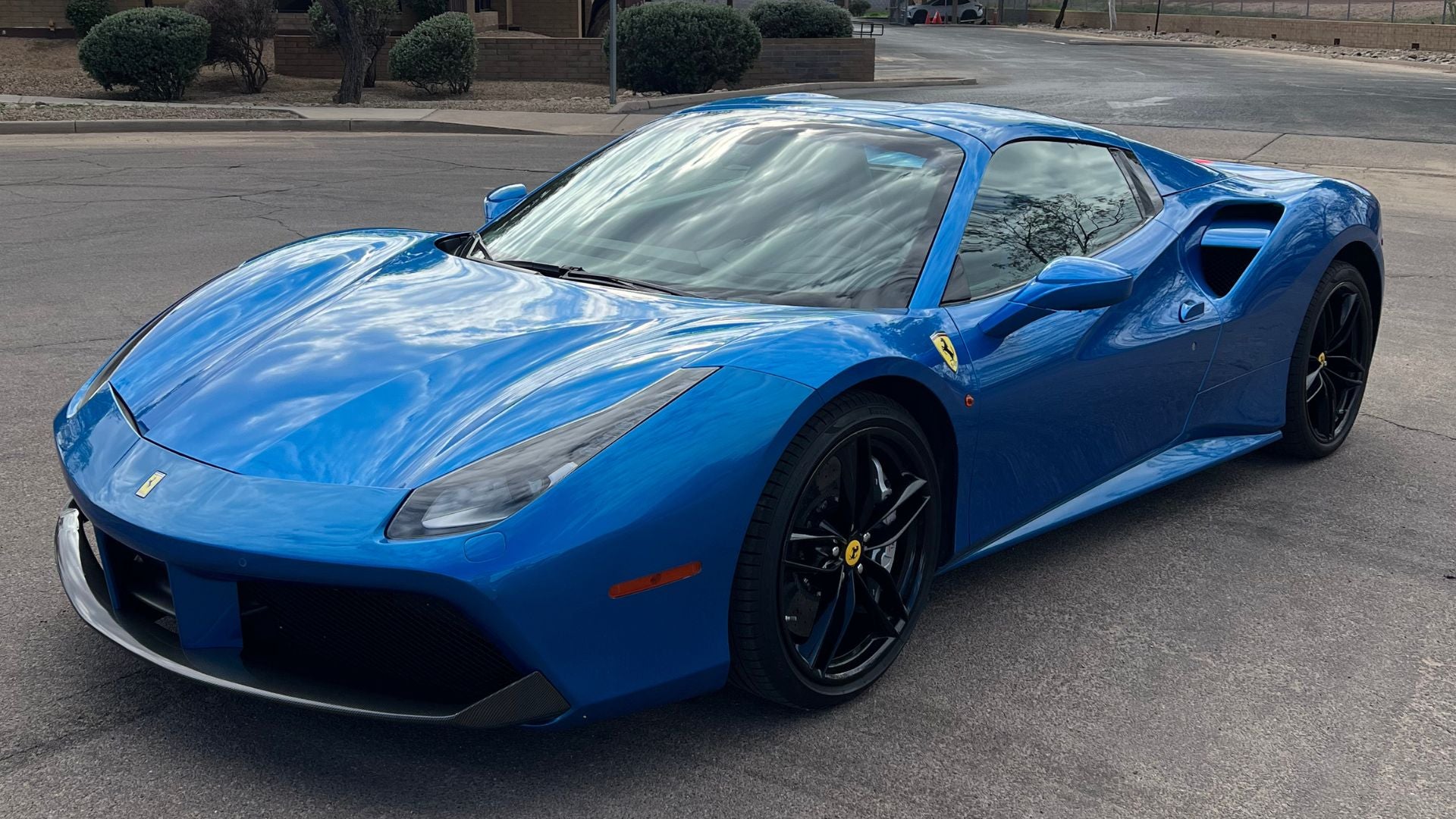 Blue Ferrari with paint protection film and carbon fiber accents in Scottsdale