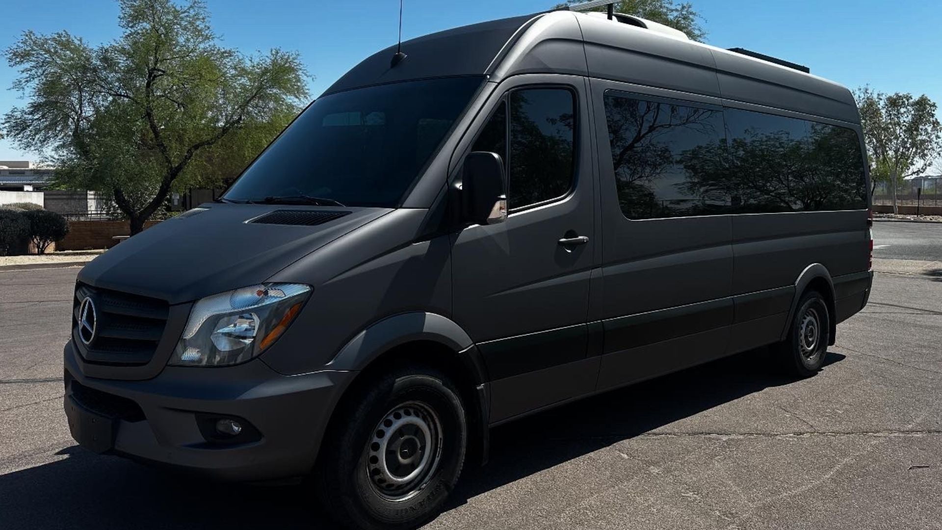 Mercedes Sprinter van wrapped in Matte Metallic Charcoal Gray vinyl