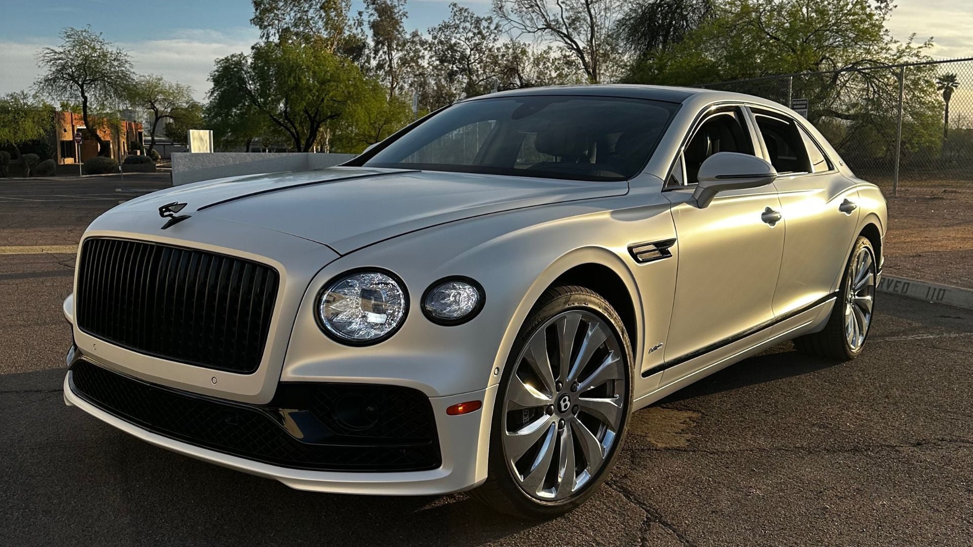 Bentley wrapped in Cheetah Wrap Satin Pearl White vinyl 