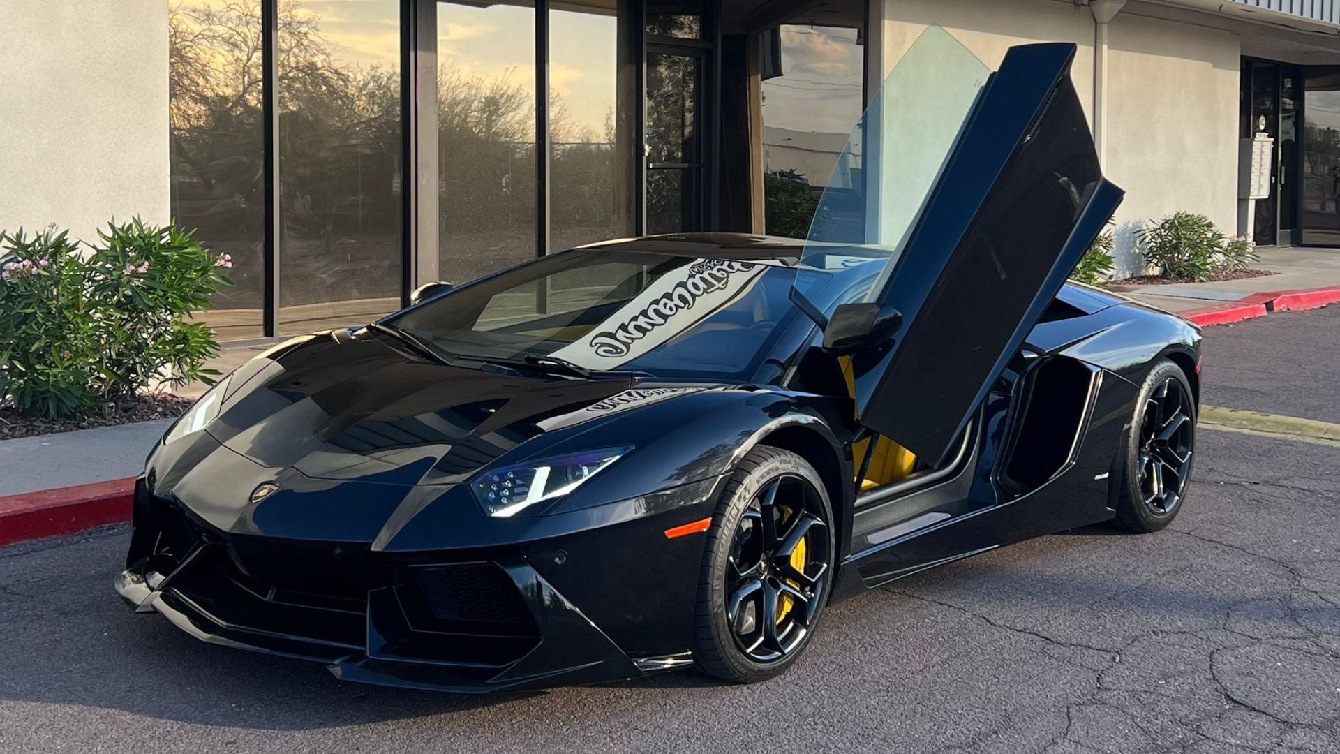 Lamborghini Aventador with full front paint protection film (PPF) clear bra in Tempe AZ parked outside Innovated Wraps
