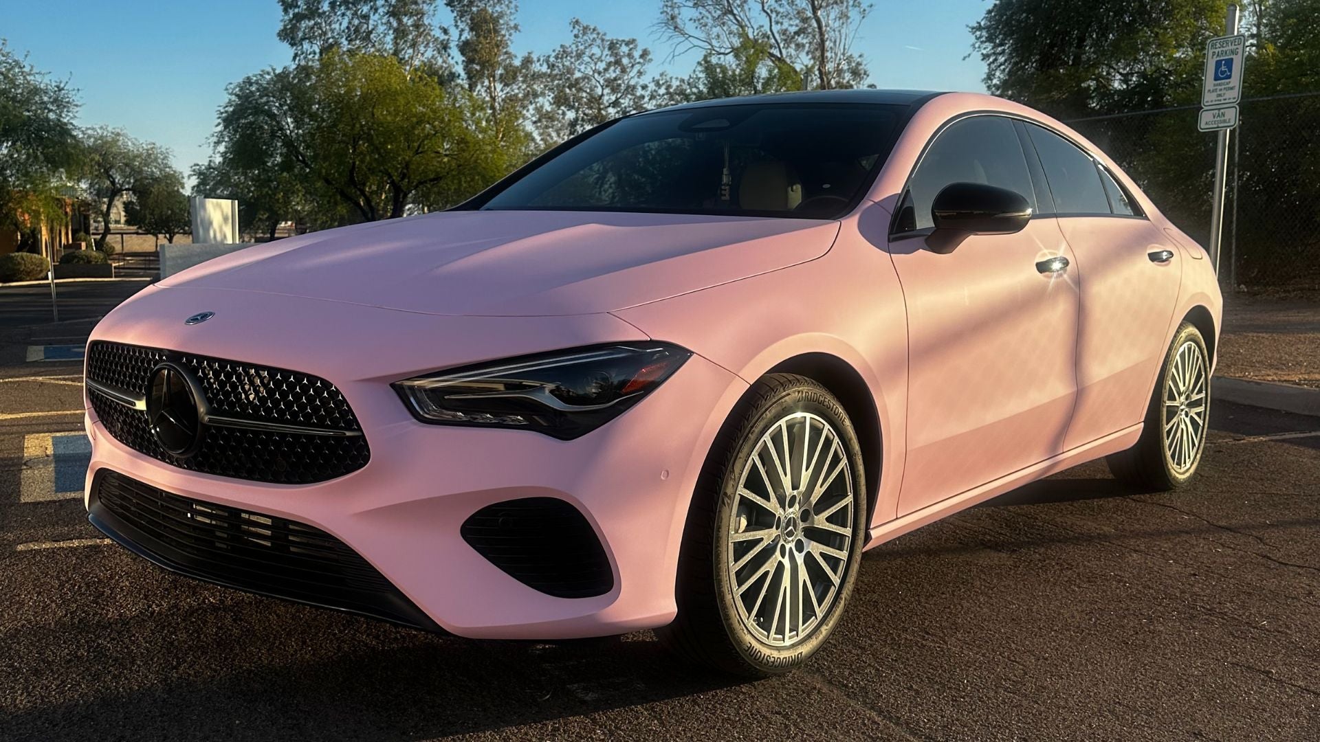 2025 Mercedes wrapped in KPMF Stealth Piggy Bank matte pink vinyl with chrome delete