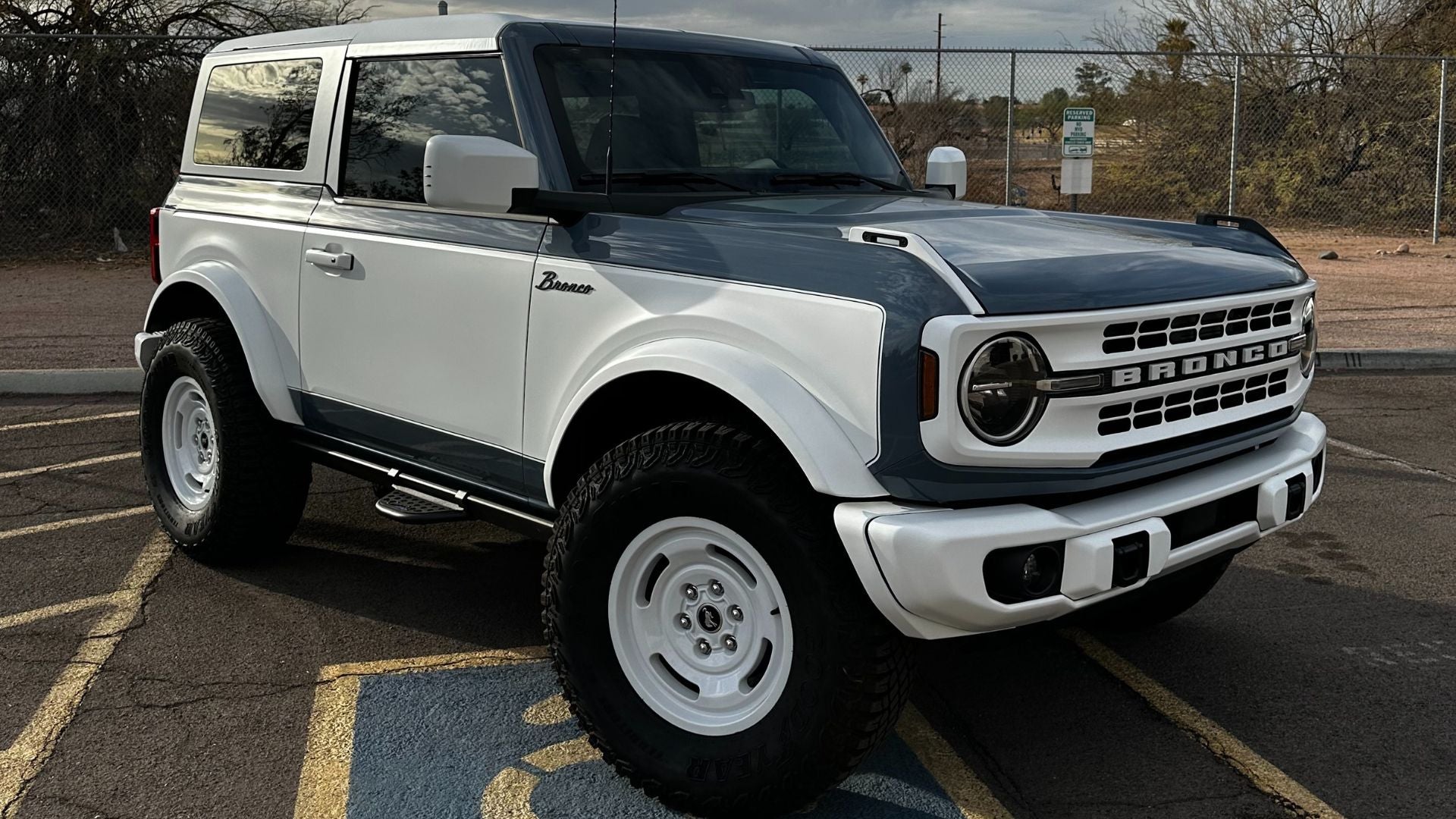 Ford Bronco retro-style vinyl wrap with pinstripe and white accents in Tempe, Arizona